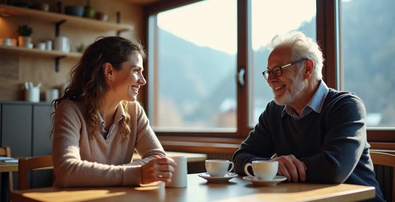 Deux professionnels échangeant autour d'un café dans un cadre neutre en Suisse